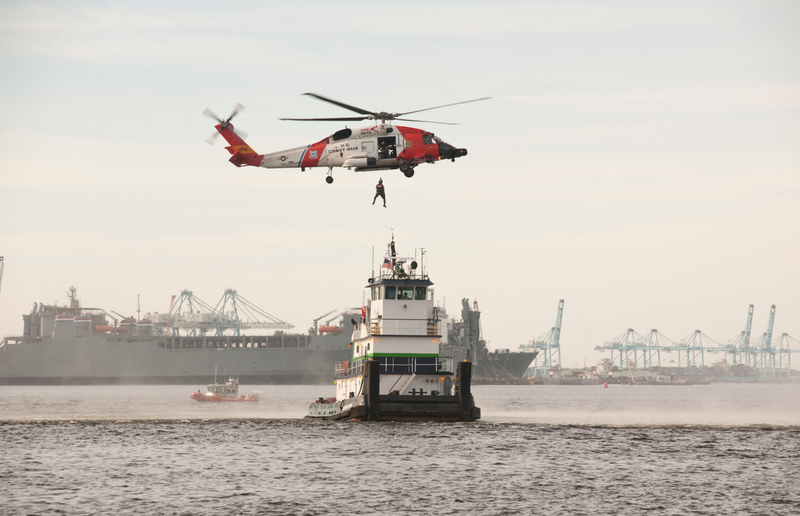A Coast Guard unit conducts a search and rescue exercise on the Elizabeth River near Norfolk, Virginia. Some day, someone is going to have to do this is in space.